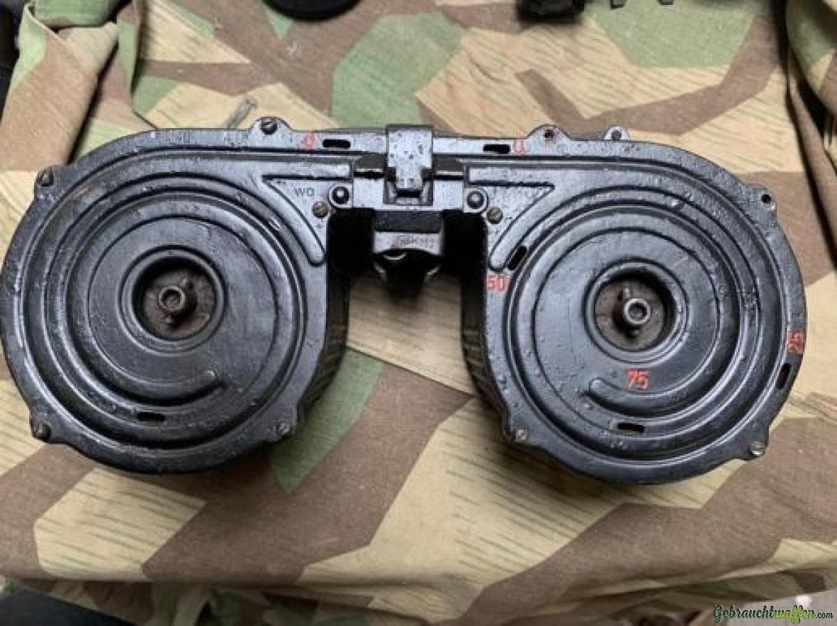 Cherche double tambour pour MG 34